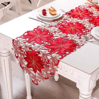 China Traditional Poinsettia Embroidered Runner Holly Leaf Table Linens New Year Christmas Decorations Country Style Table Runner Wedding with Tassels for sale