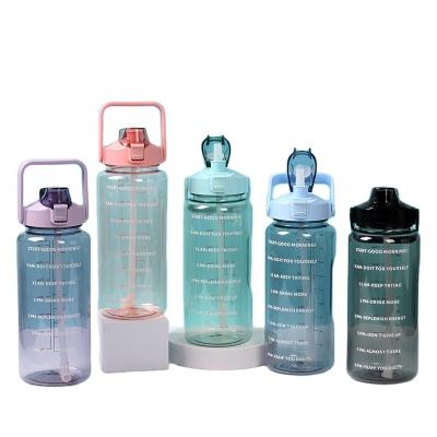 China Sustainable Portable Gym 2L 64 Ounce Clear Transparent Motivational Fitness Sports Water Bottles With Time Maker And Straw for sale