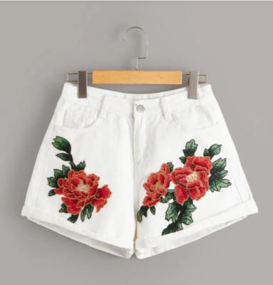 China OEM Sustainable Women's Clothing High Quality Women Mid Waist Rose Floral Embroidered Denim Shorts Shorts for sale