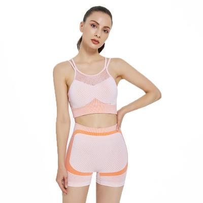 China 2022 Breathable Mesh Fit Yoga Activewear Sling Yoga Bra Top Sexy Slim Sexy Hip Set Seamless Women Fitness Shorts for sale