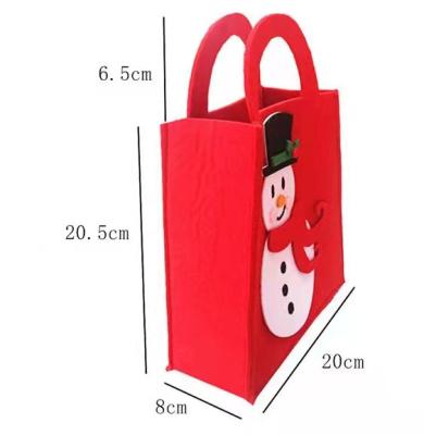 China High Quality 2021 New Hot Selling Reusable Lady Shopping Bag Clutch Santa Claus Hand Felt Tote Bag Christmas Gift for sale