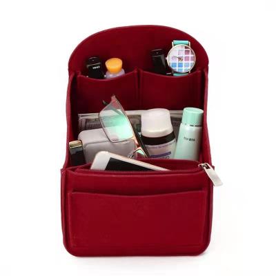 China Travel Multifunctional Computer Storage Anti-theft Felt Cosmetic Bag for sale