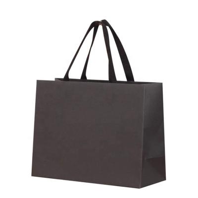 China Hot Foiled Stamping Black Matt Paper Shopping Gift Jewelry Business Recyclable Wholesale Custom Packaging Bag With Cotton Rope Handles for sale