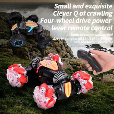 China Obstacle Avoidance 2.4G Double Side Remote Control Drift Twisting Stunt Car 4WD Radio Control Toys Hand Gesture Rc Car for sale