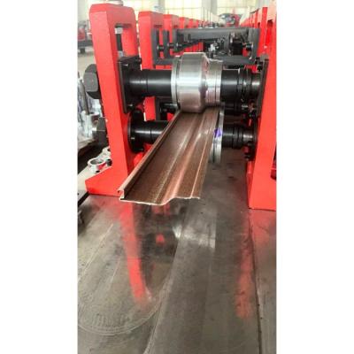 China OEM Customized Galvanized Steel Rolling Door Bottom T Shaped Profile Roll Forming Machine for sale