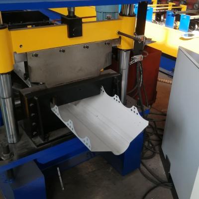 China Hydraulische lochende Ridge Cap Roll Forming Machine-Perforierung 10m/Min zu verkaufen