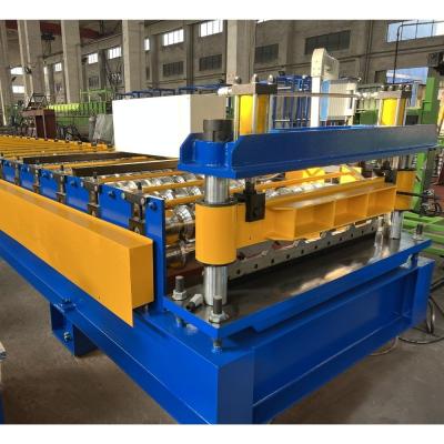 China rollo trapezoidal del panel del tejado del grueso de 0.3m m que forma la máquina, altura PPGI de 28m m que cubre la prensa de batir de la hoja en venta