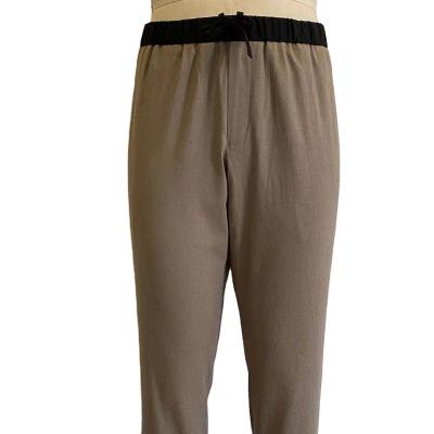 China Factory direct sales soft khaki men's casual sports elastic pants for sale