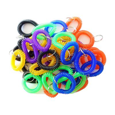 China Hangs Soft Tightly Spring Spiral Coil Wrist Key Band Key Colorful Waterproof Key Chain for sale