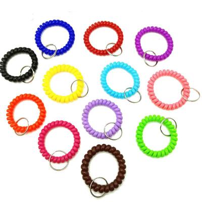 China Hangs Soft Tightly Spring Spiral Coil Wrist Key Band Key Colorful Waterproof Key Chain for sale