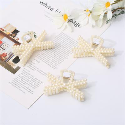 China Factory direct sales hair accessories pearl hair clip lady flat plastic white hairpin exquisite temperament shark clip for sale