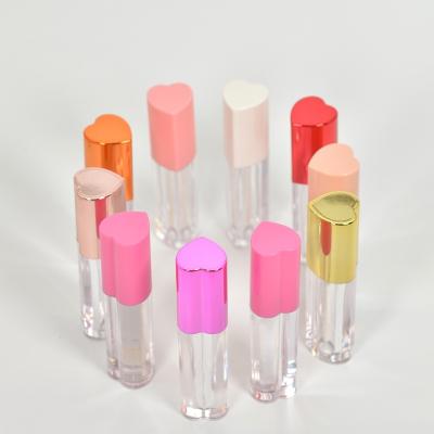 China Fashionable Heart Shape Lip Gloss Container Tube Transparent Bottle Plastic Lip Gloss Tubes for sale