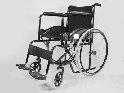 China Powder Coating Folding Steel Wheelchair With Solid Wheel for sale