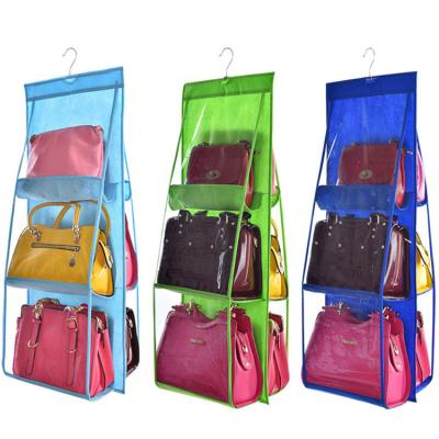 China Folding Clear Transparent Purse Organizer Dust Proof Storage Hanging Bag For Wardrobe Closet With 6 Pockets for sale