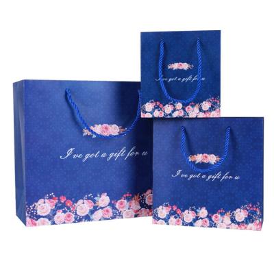 China Recyclable Custom Logo Flat Bottom New Product Packaging Printing Bow Mails Premium Art Paper Gift Bag for sale