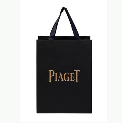 China Custom Logo Premium Hot Stamping Luxury Paper Shopping Bag Recyclable With Ribbon for sale