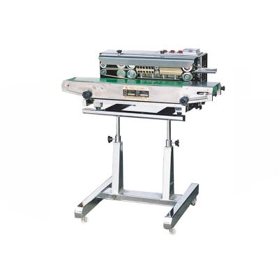 China SF150LD Automatic Food Holder Continuous Embossing Aluminum Foil Pouch Plastic Bag Heat Sealing Machine for sale