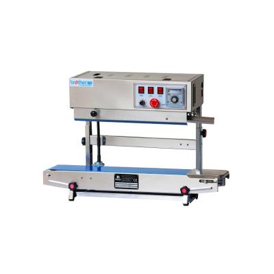 China Automatic Embossing Food Vertical Plastic Bag Film Continuous Holder Up Pouch Strip Sealing Machine for sale