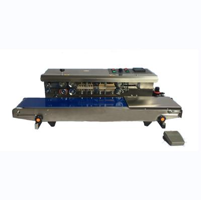 China Automatic Horizontal Embossing Continuous Food Plastic Bag Film Strip Sealing Machine With Nitrogen Gas Flushing for sale