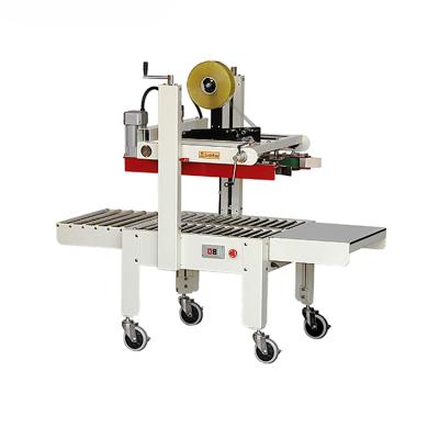 China Food Model Side Drive Belt Strip Case Box Carton Box Sealer Semi Automatic Top Sealing Packing Machine for sale