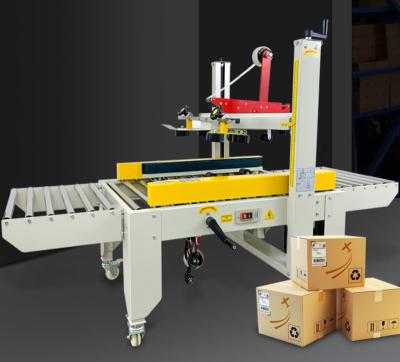 China FXC-5050 Semi Automatic Food Crate Carton Band Sealer Top Bottom Box Taping Sealing Machine for sale