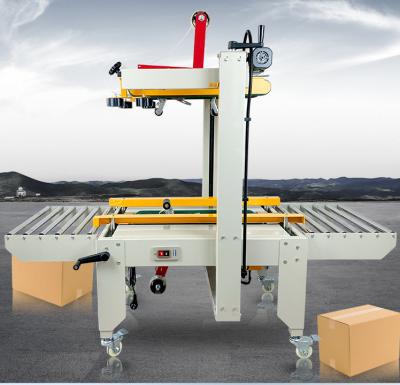 China FXJ6050 Semi Automatic Food Belt Carton Sealer Box Case Sealer Taping Carton Sealing Machine for sale