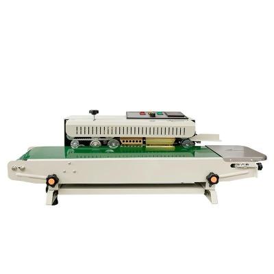 China Continuous Automatic Food Plastic Bags Machine Continuous Sealing Strip Sealer for sale