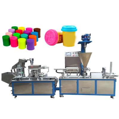 China Automatic play dough flour dough soft dough cup filling and packing machine cup clay extruder machine zu verkaufen