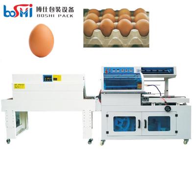 China Automatic POF PVC shrink film Egg shrink wrap machine egg shrinking tunnel packing machine for sale