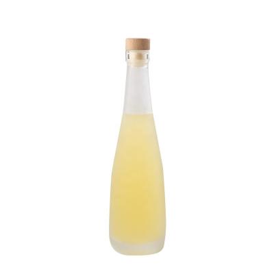 China Recyclable Recycled Empty Ice Wine Vodka Glass Bottle Red Glass Wine Bottles Clear Tea Bottle for sale