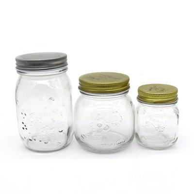 China Viable Different Size Empty Clear Storage Jars Set Candy Storage Jar Glass Jam Jar Christmas Mason Bottle for sale