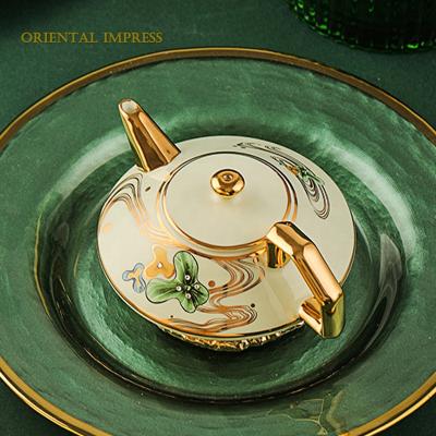 China 2021 Sustainable New Design Diamond Shape Gold Tracing Bone China Portable Tea Set for sale