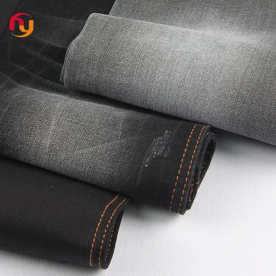 China Breathable good price high quality heavy knitted Denim fabrics stretch with black jeans fabric stretch cotton polyester raw denim fabric for sale