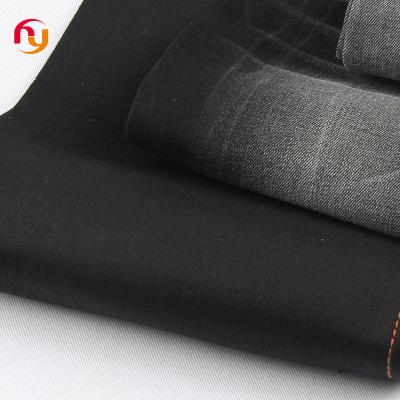 China Breathable suppliers cheap price wholesale high quality heavy cotton washed denim fabric knitted Denim jeans material fabrics stretch for sale