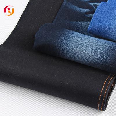 China Breathable suppliers price cotton knitted denim jeans fabrics indigo blue satin elastic denim Mussel high quality raw stretch denim fabric for sale