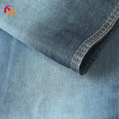 China Breathable wholesale price cotton knitted denim jeans material fabrics satin elastic denim Mussel high quality raw stretch denim fabric for sale