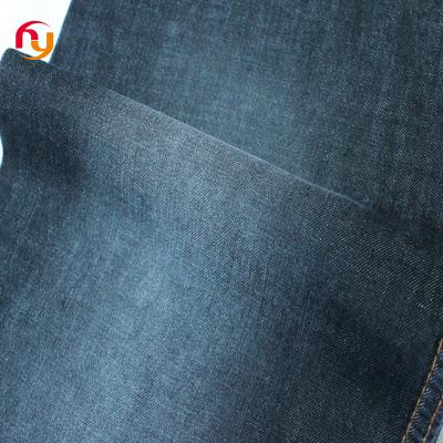 China Breathable cheap prices cotton knitted denim jeans material fabrics satin elastic denim Mussel high quality raw stretch denim fabric for sale