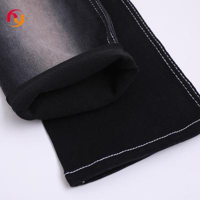 China Breathable suppliers wholesale cheap prices stock lot  color knitted jeans cloth material 8oz cotton stretch satin raw denim jean fabrics for sale