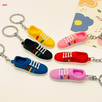 China 3D Mini Shoes Keychain Character Keychain With Metal Key Ring Custom Plasitc Figure Keychain for sale