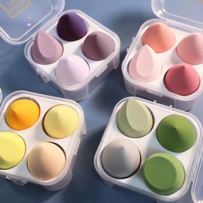 China Boutique New Boxed GUA Factory Latex Puff Beauty Powder Puff Egg Free Base Box Water Drop Sponge Makeup Oblique Cut Egg for sale