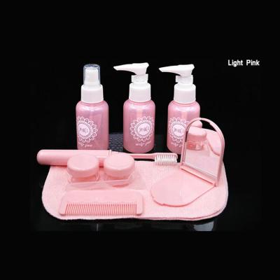 China BEAUTY PACKAGING factory direct sales travel bottle set 10pcs empty portable cosmetic plastic mirror toothbrush bottle spray bottle towel for sale