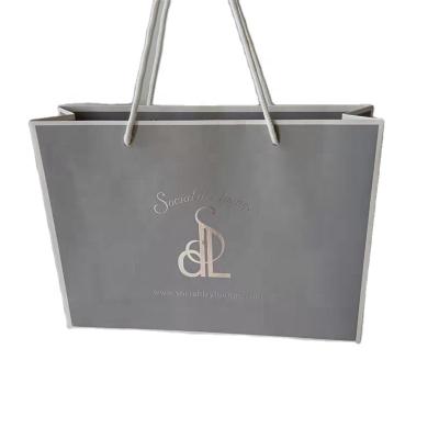 China High Quality And Eco - Friendly Paper Bags Gray Gift Shopping Bag Custom Printed Logo Shopping Paper Bags for sale