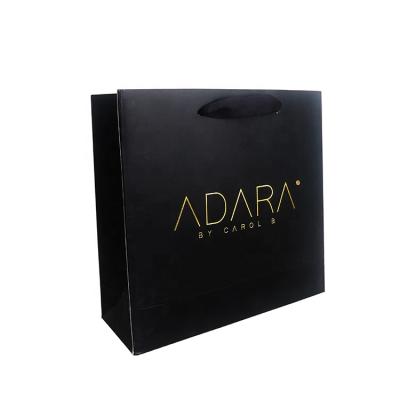 China New Design Coated Custom Black Paper Bags With Gold Foiled Logo Printed for sale