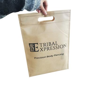 China Eco-friendly custom die-cut non woven handle shopping bags with logo for clothes shoes boutique store packaging for sale