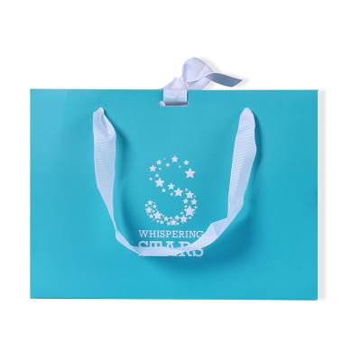 China Handmade Eco-friendly Luxury Boutique Packaging Focus Sketch Private Label Gift Custom Paper Bag With Ribbon Handle for sale