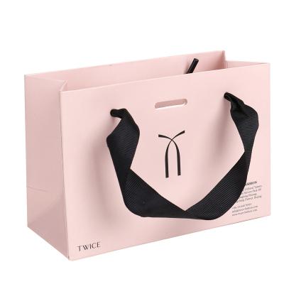 China Jewelry Handmade Pink Paper Bag With Logo Printing And Handles Black Paper Bag for sale