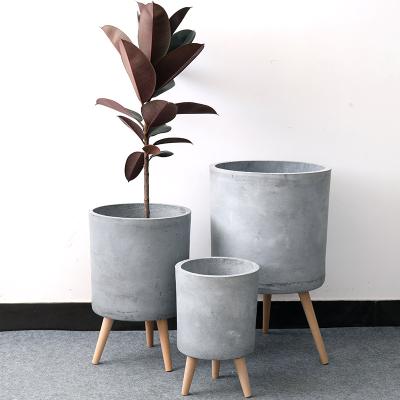 China Creative Wholesale Europe Texture Outdoor Modern Minimalist Wooden Rack Gauge Cement Flower Pot Garden Planter Ornaments Large for sale