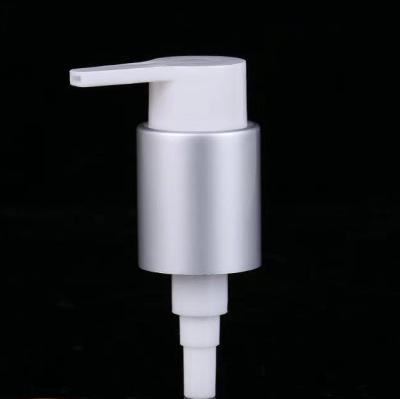 China Cosmetic 28 / 410 Staple Lock Lock Left Right Side Cosmetic Plating / Anodized Aluminum Lotion Pump for sale