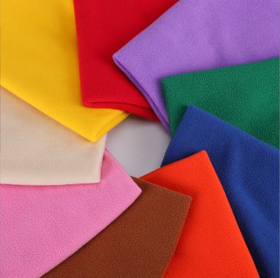 China Plain Single Cloth Anti Pill Wholesale Polyester Brush Flip 100% Knitted Fleece Fabric for sale