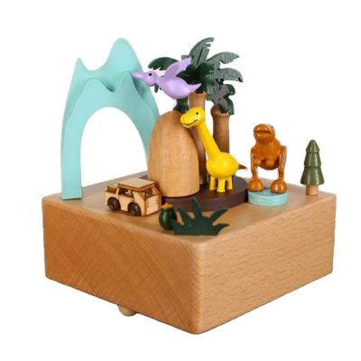 China Europe Castle in the Sky Wooden Wholesale Musical Box Jurassic Melody Dinosaurs Music Box for Gifts for sale